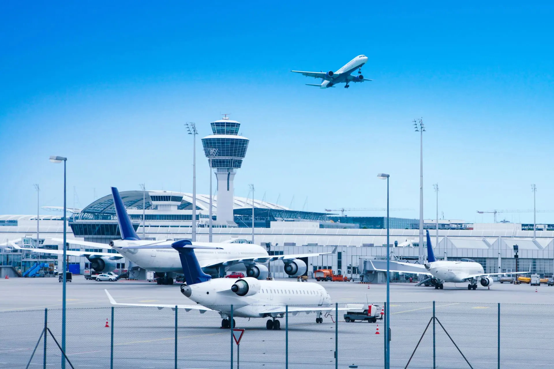 Busy airport with central control tower